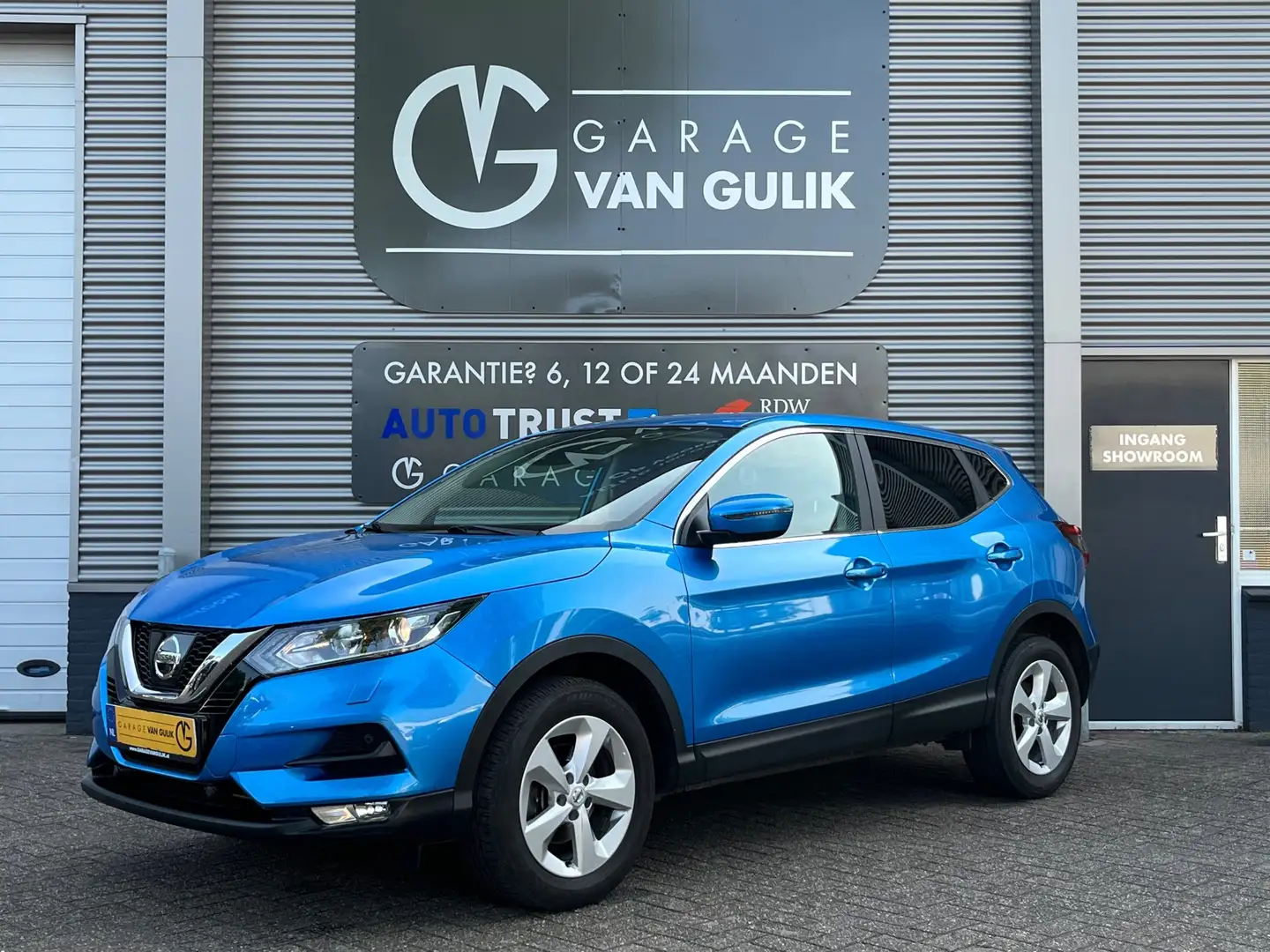 Nissan Qashqai 1.2 116PK Clima,Cruise,Trekhaak,Navigatiesysteem,S Bleu - 1