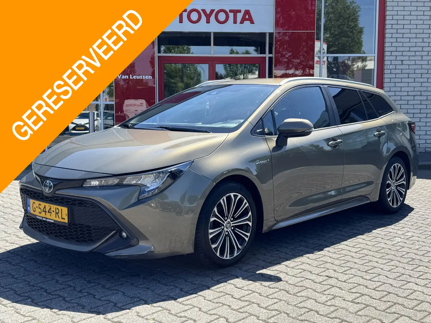 Toyota Corolla Touring Sports 1.8 HYBRID DYNAMIC NL-AUTO DEALER-O Groen - 1
