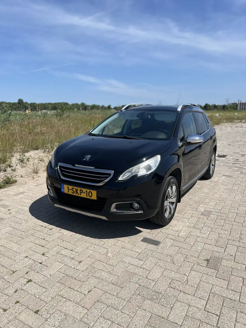 Peugeot 2008 1.2 VTi Allure Zwart - 1