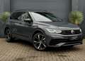 Volkswagen Tiguan 1.5 TSI 3x R-Line Pano/Head Up/Digital/Carplay Grijs - thumbnail 1
