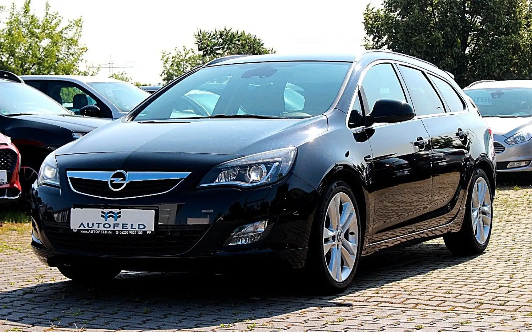Opel Astra Sports Tourer 1.6/VOLL SHEFT/NAVI/BIXENON/ Zwart - 1