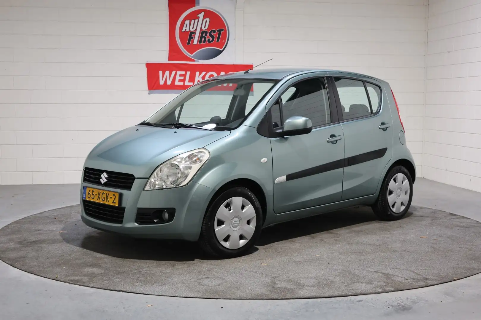 Suzuki Splash 1.0 VVT Comfort, Lage km stand, Airco, Electrische Зелений - 1