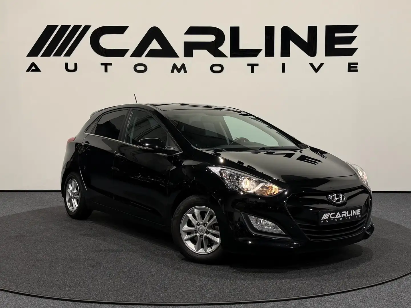 Hyundai i30 1.6 GDI i-Vision AIRCO CAMERA NAVI PDC LM NAP GARA Schwarz - 1