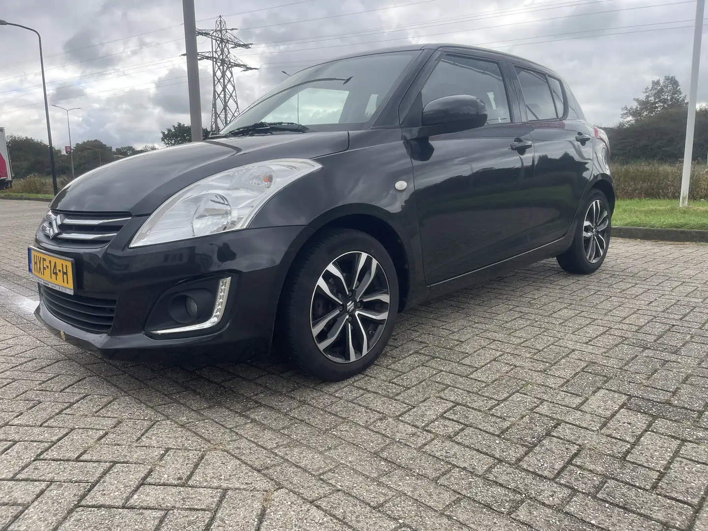 Suzuki Swift 1.2 Exclusive EASSS x-tra edition 2016 Zwart - 1