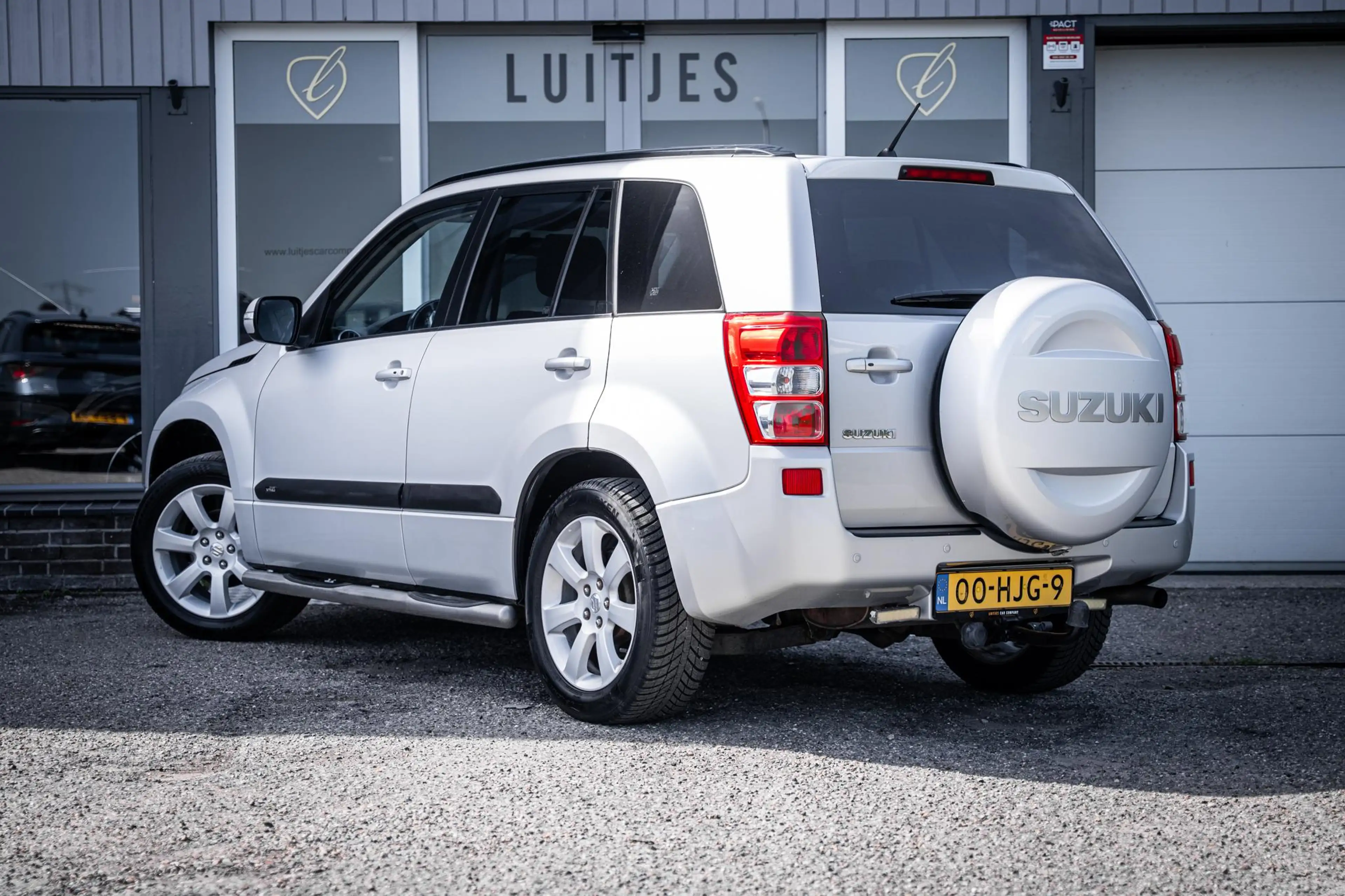 Suzuki Grand Vitara 2.4 4WD 169pk AUT High Executive |Schuifdak|Leder| — photo 14