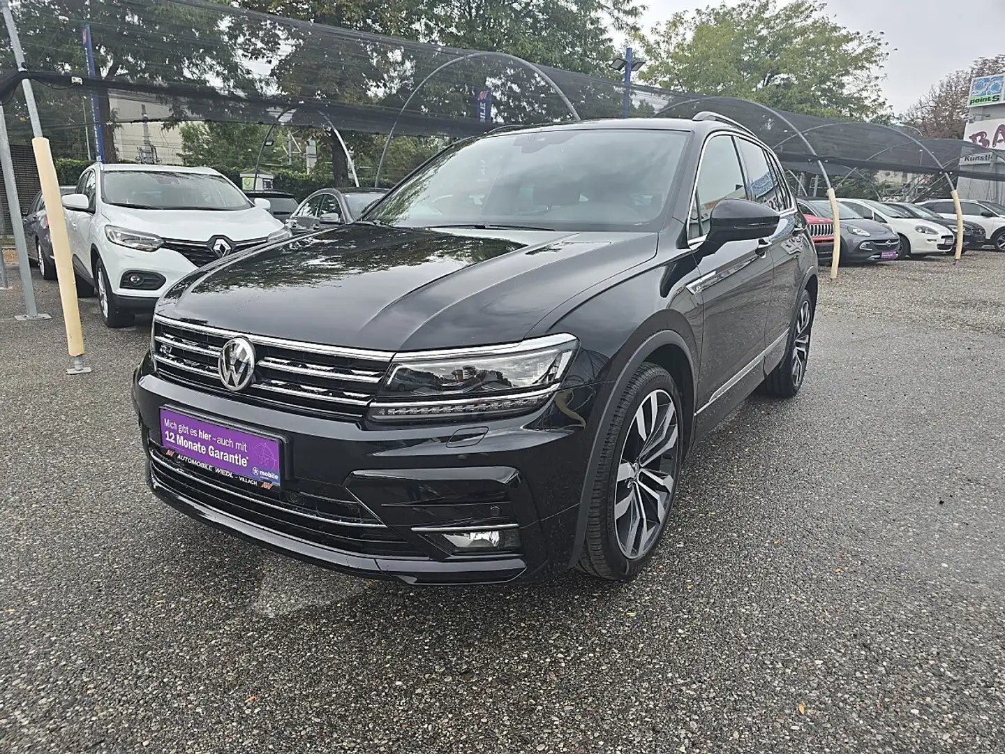 Volkswagen Tiguan 2,0 TDI SCR Sky *R-LINE*PANO* Schwarz - 1