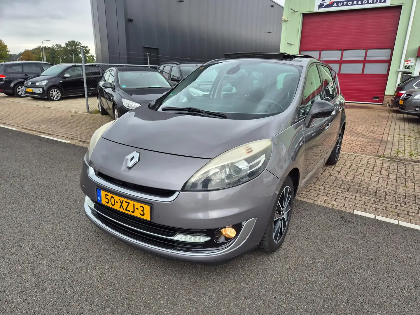 Renault Grand Scenic 1.5 dCi 110pk 6bsk Bose 7p Panorama Clima Grijs - 1