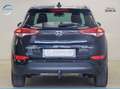 Hyundai TUCSON 1.6 GDi Trend 132PS Navi R-Cam 1Hand Schwarz - thumbnail 5