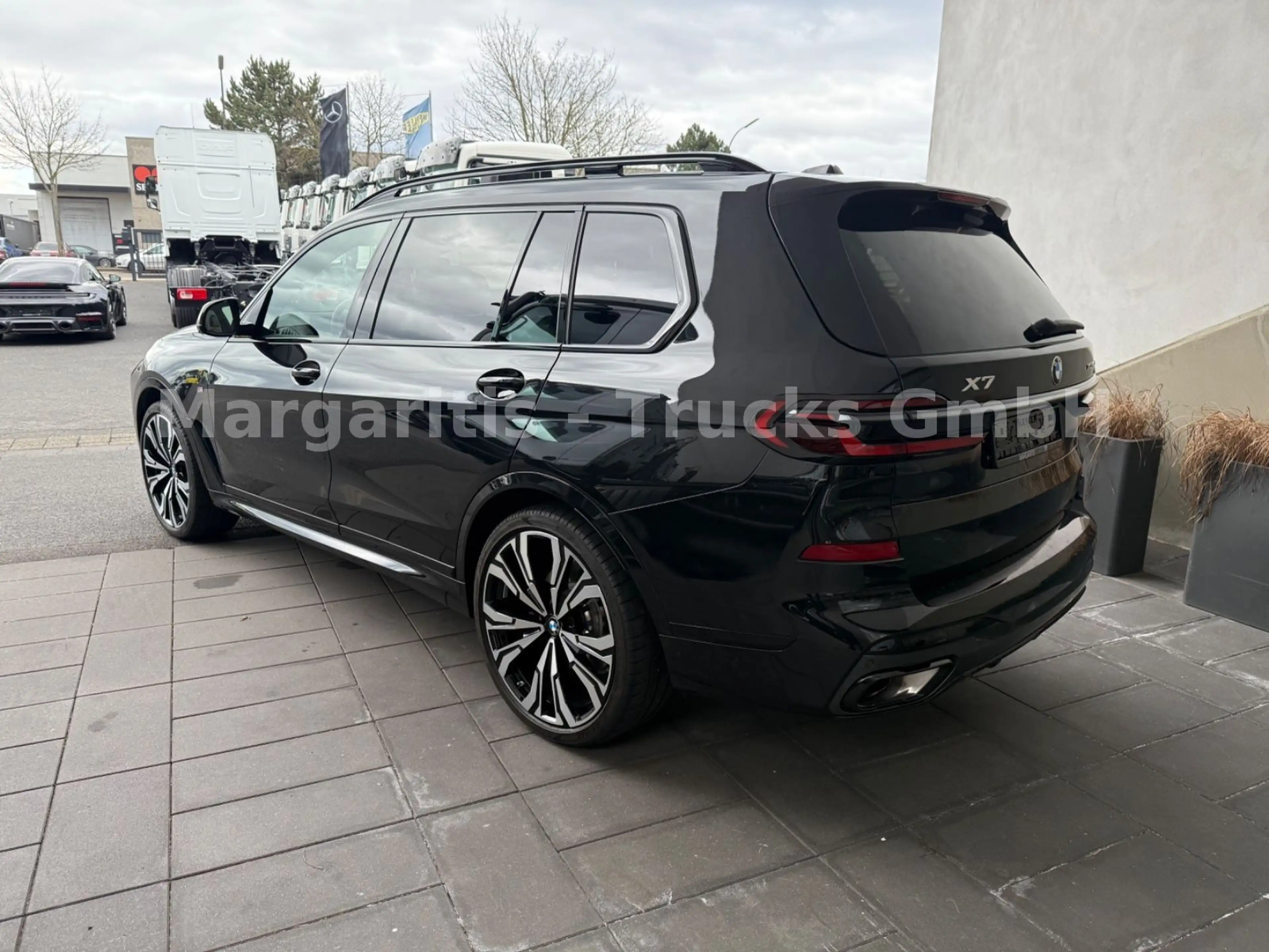 BMW X7 xDrive40d/MPaketPro/Pano/23"/H&K/Carbon — photo 7