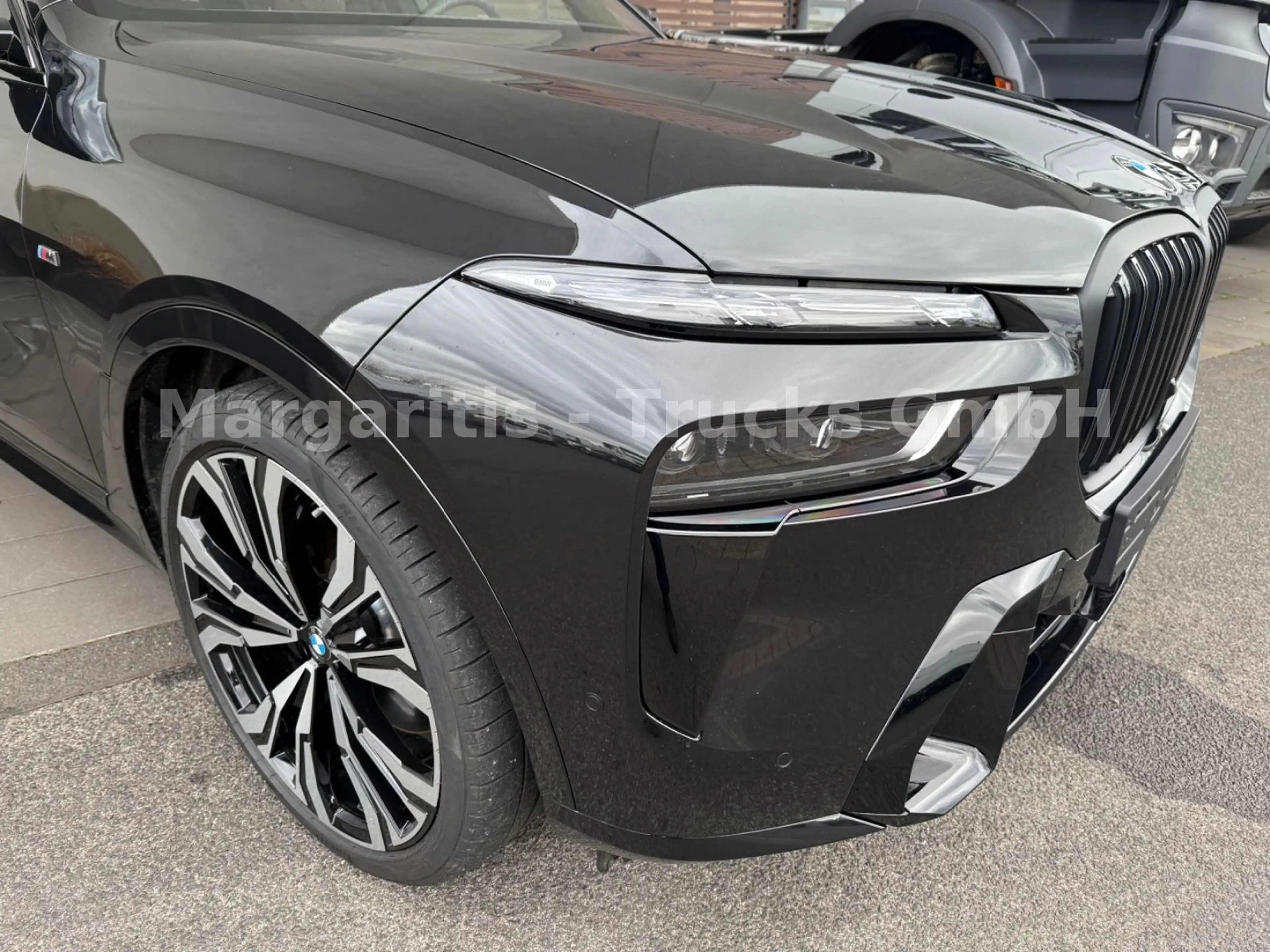 BMW X7 xDrive40d/MPaketPro/Pano/23"/H&K/Carbon — photo 4