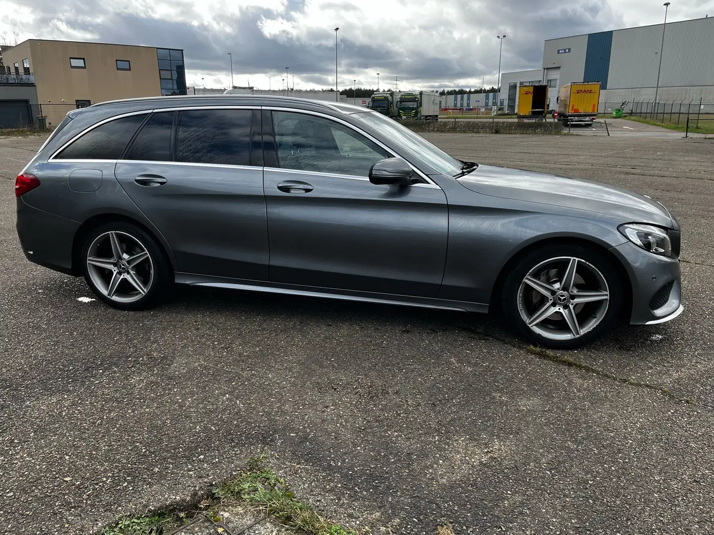 Mercedes-Benz C 180 (BlueTEC) d T 7G-TRONIC AMG Line Grijs - 2