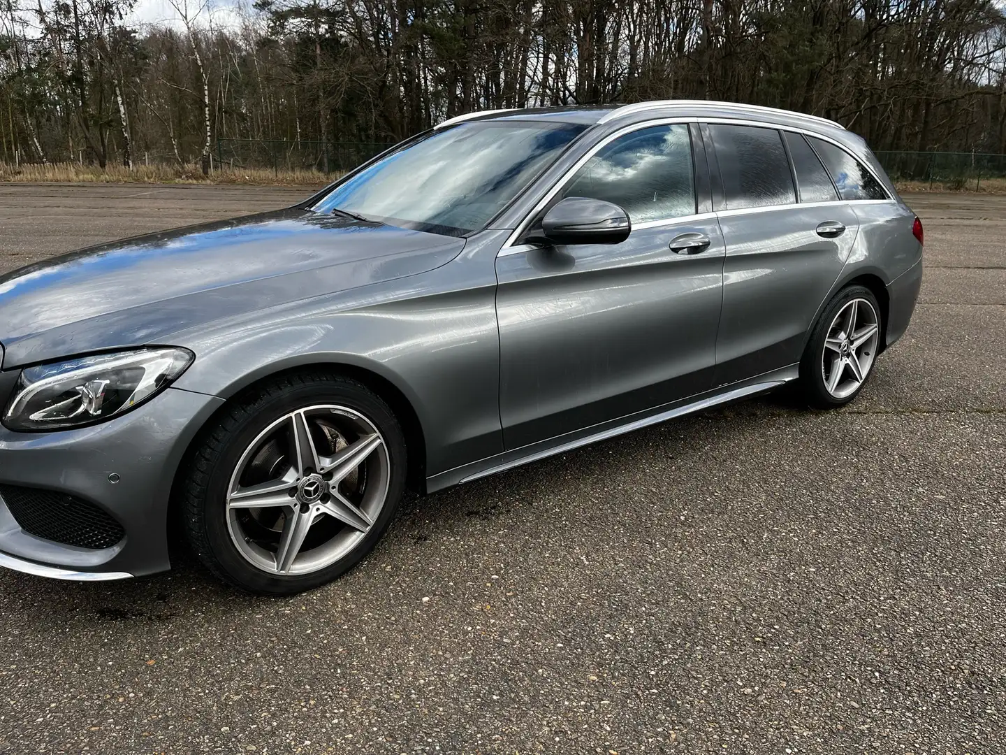 Mercedes-Benz C 180 (BlueTEC) d T 7G-TRONIC AMG Line Grijs - 1