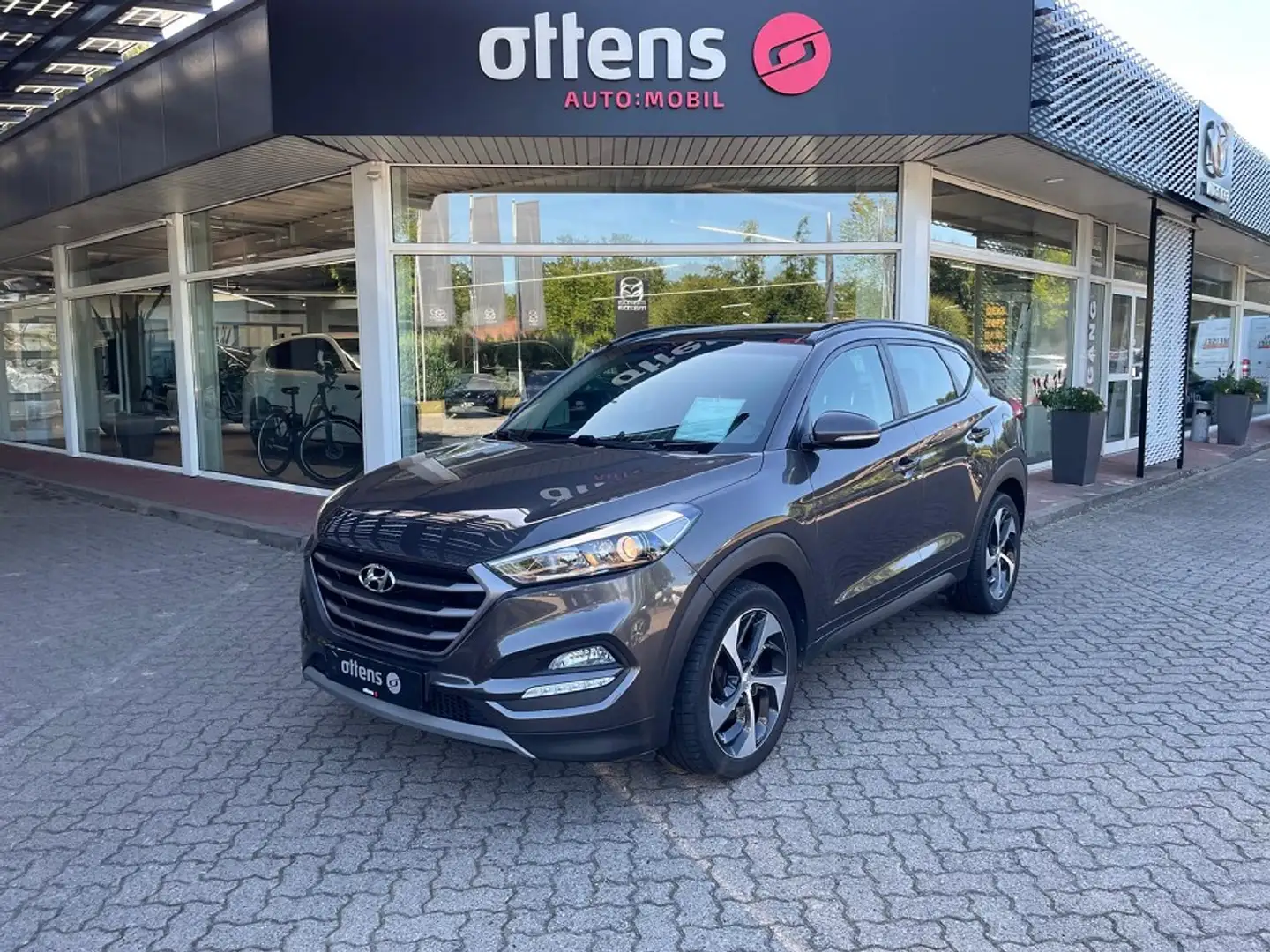 Hyundai TUCSON 1,6i Premium DCT; Navi, Kamera,AHK Gris - 1