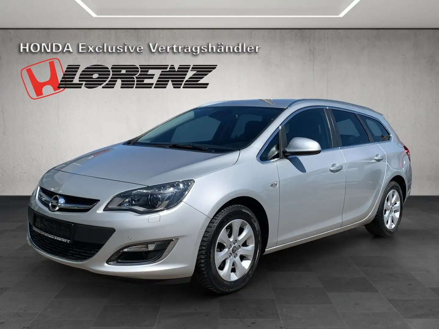 Opel Astra SportsTourer 1,4T Automatik Exklusiv *AHK* Argento - 1