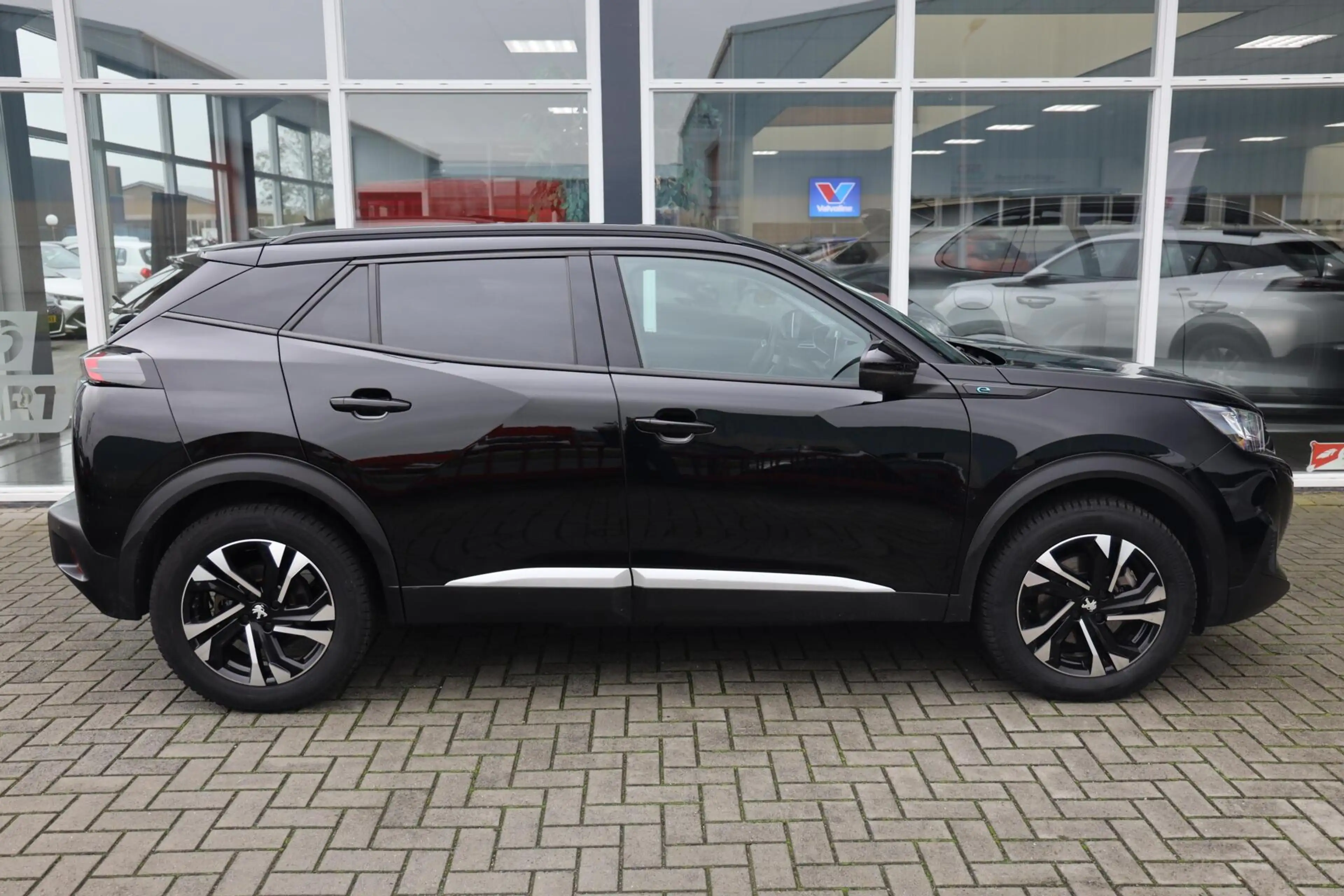 Peugeot e-2008 EV Allure Pack 50 kWh|3-Fase|Camera|Carplay|Clima| — photo 7