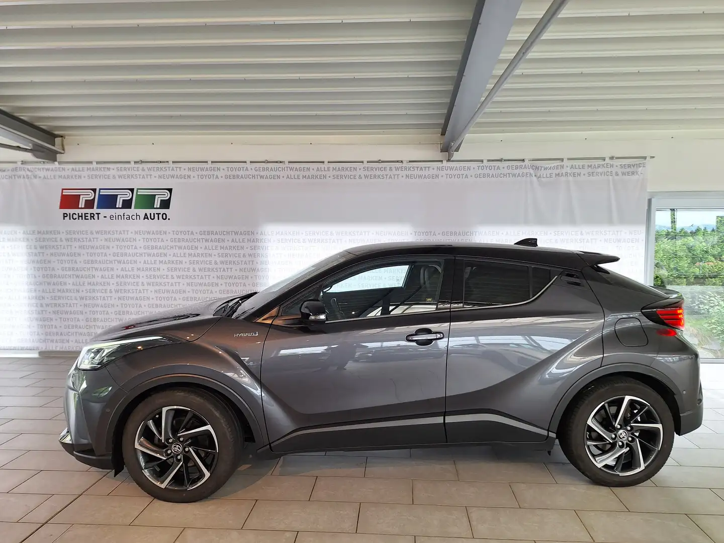 Toyota C-HR 2,0 Hybrid Style Selection Lenkrad/Sitzheizung Garantie Serviceheft Navi Kamera, wie GR Sport nur mit 18" Alufelgen Grau - 2