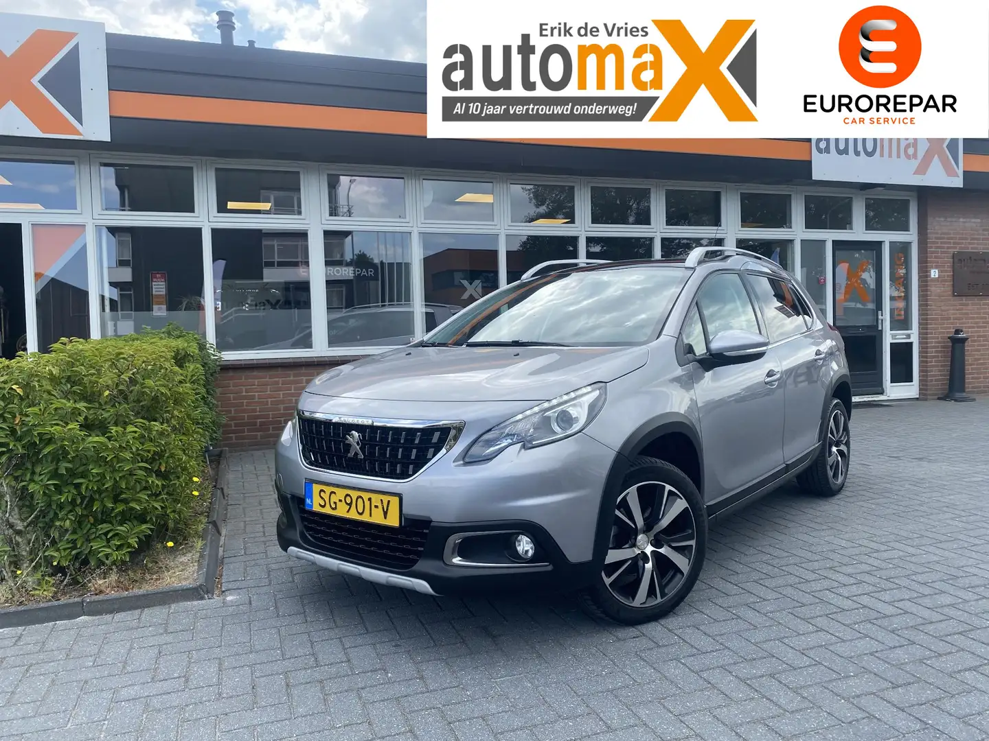 Peugeot 2008 1.2 Allure |Dealer Onderhouden!|Navi!| Grijs - 1