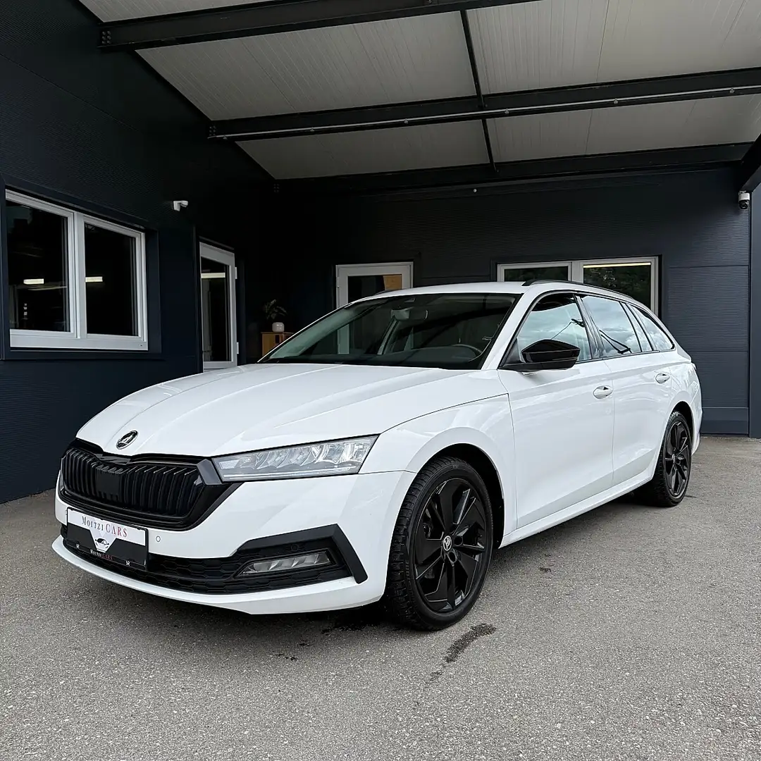 Skoda Octavia Combi 2,0 TDI Business DSG Weiß - 1