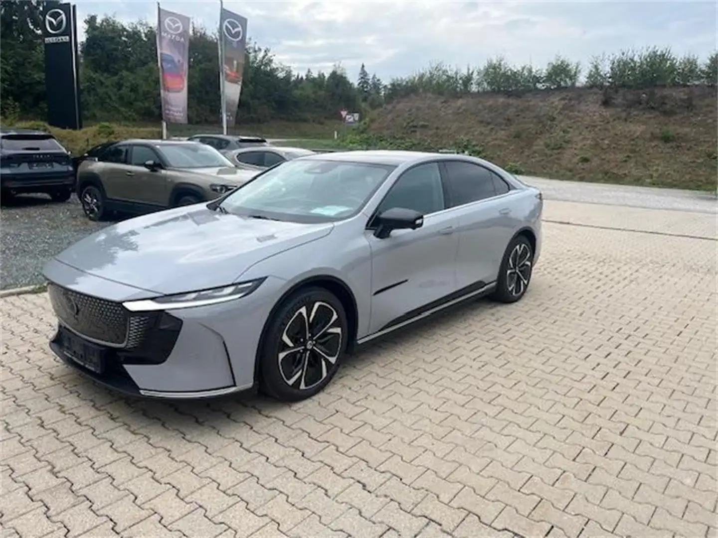 Mazda 6e 68,8kWh SR Takumi Jahreswagen inkl. Winterräder Grau - 1