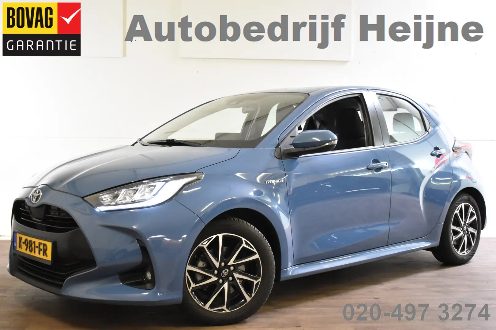 Toyota Yaris 1.5 HYBRID BUSINESS PLUS CAMERA/NAVI/TREKHAAK Blauw - 1