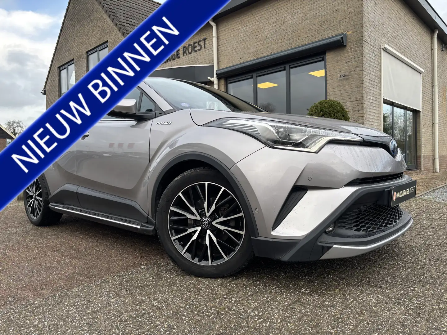 Toyota C-HR 1.8 Hybrid Automaat Dynamic All-Seasons / Navigati Gris - 1