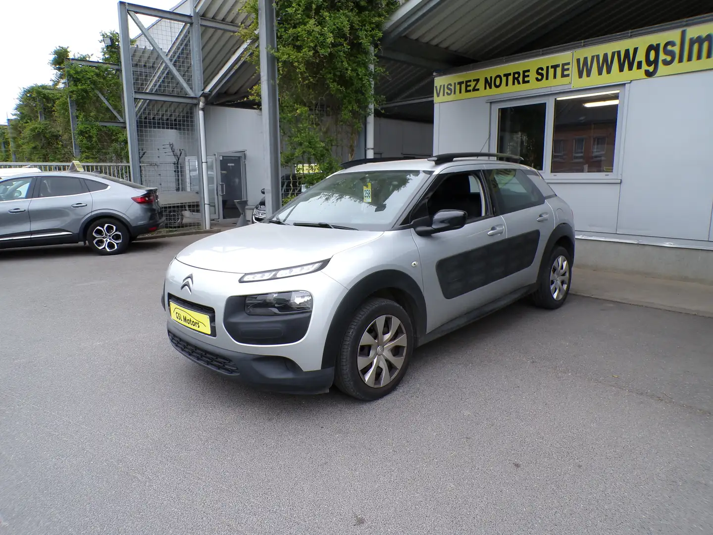 Citroen C4 Cactus 1.6BlueHDi 100cv gris 07/16 Airco GPS Cruise Radio Gris - 1