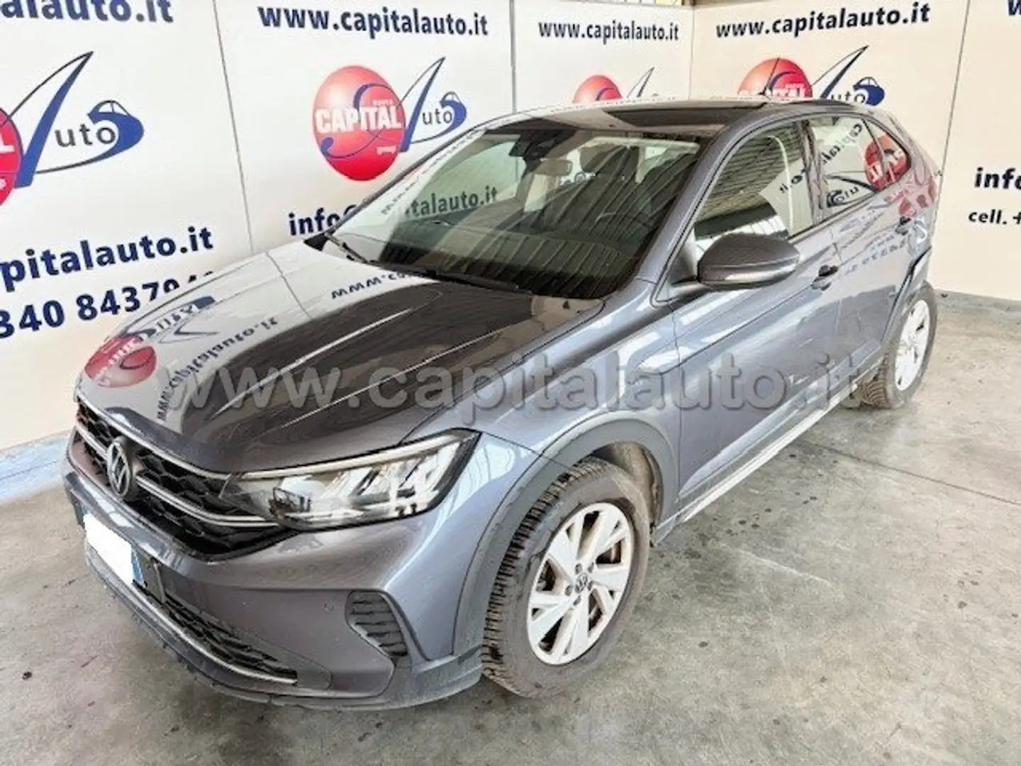 Volkswagen Taigo 1.0 tsi Life 110cv NETTO 9900 Grijs - 1