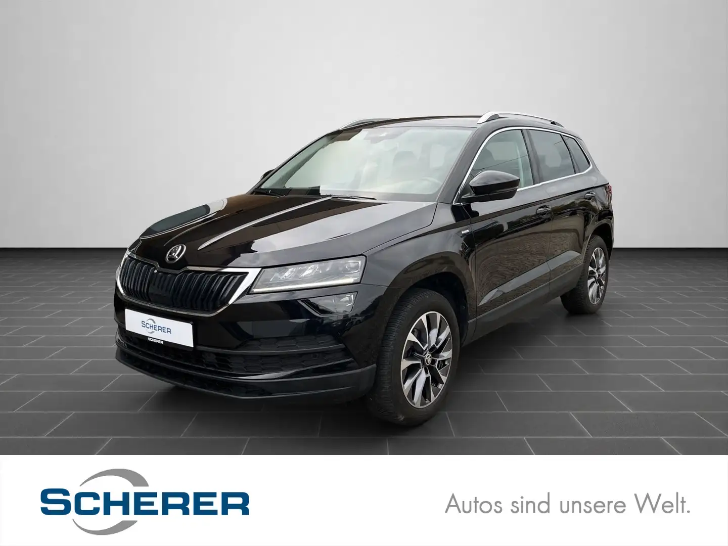 Skoda Karoq 1.5 TSI DSG 110 kW Kamera, Navi, elektr. H Schwarz - 1