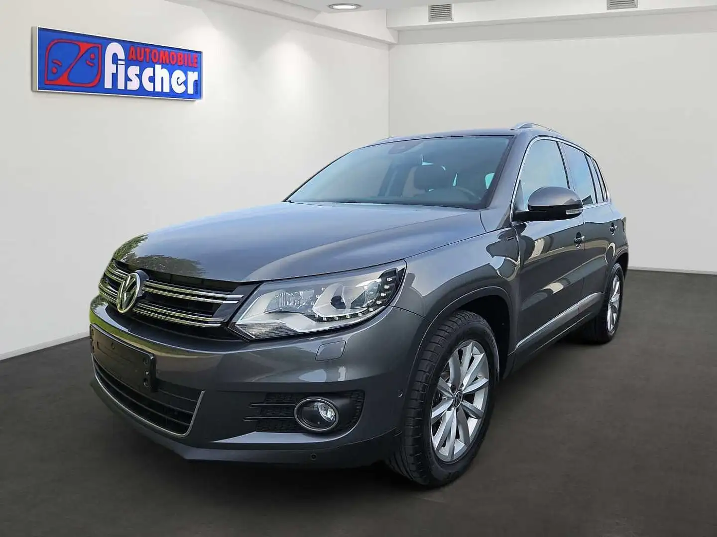 Volkswagen Tiguan 1.4 TSI DSG BMT Lounge Sport & Style Stdhzg Kamera Grijs - 1