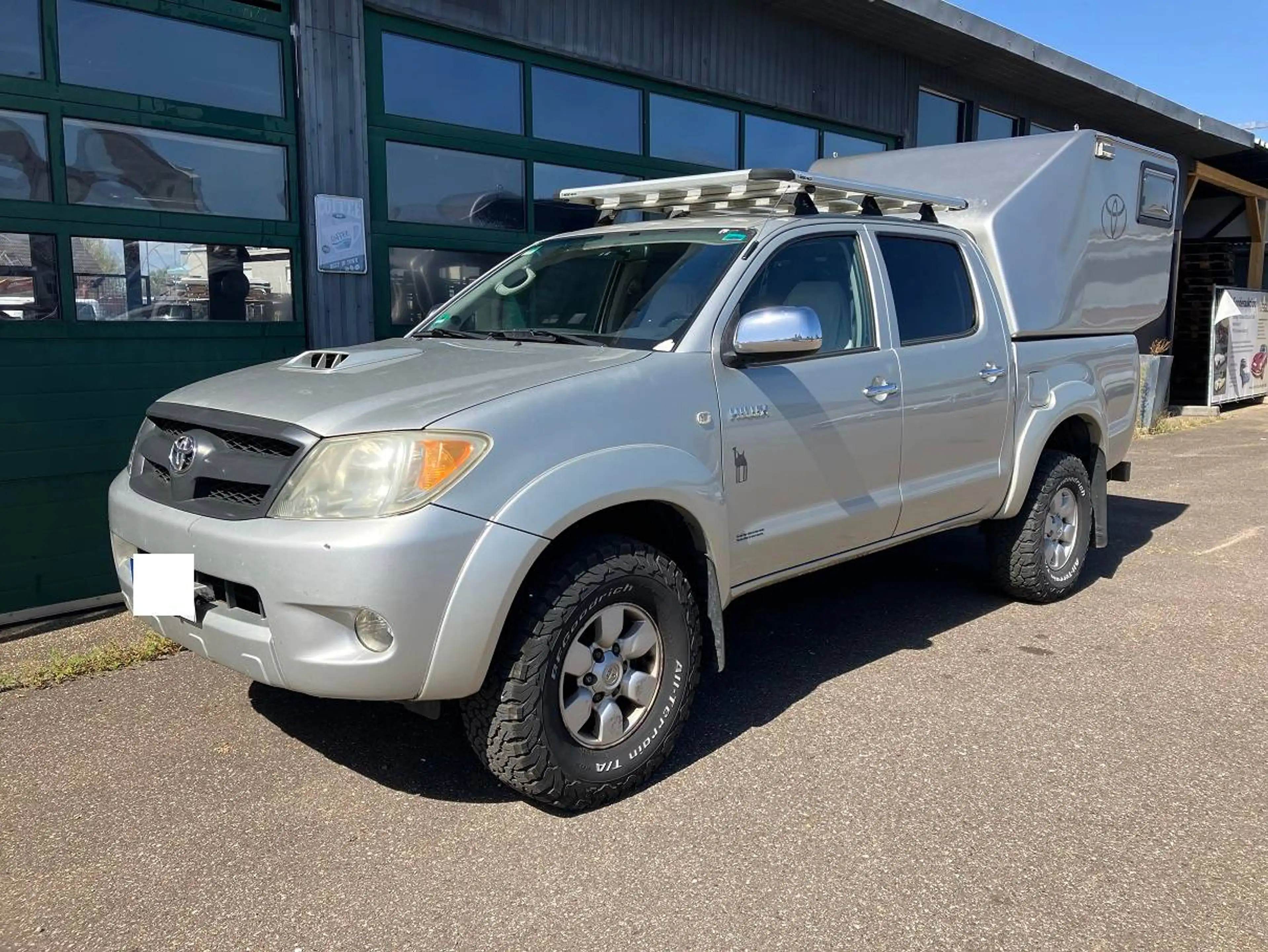 Toyota Hilux 2.5 D-4D Double Cab Sol 4x4 Absetzkabine Klima Dachträger — photo 6