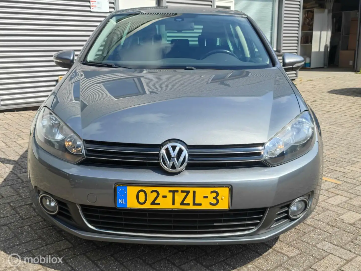Volkswagen Golf 5-deurs 1.2TSi 105pk H6 Highline Clima Navi Gris - 2