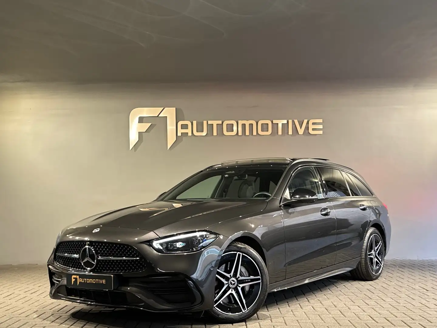 Mercedes-Benz C 300 Estate e AMG Pano|Sfeer|HuD|Keyless Gris - 1