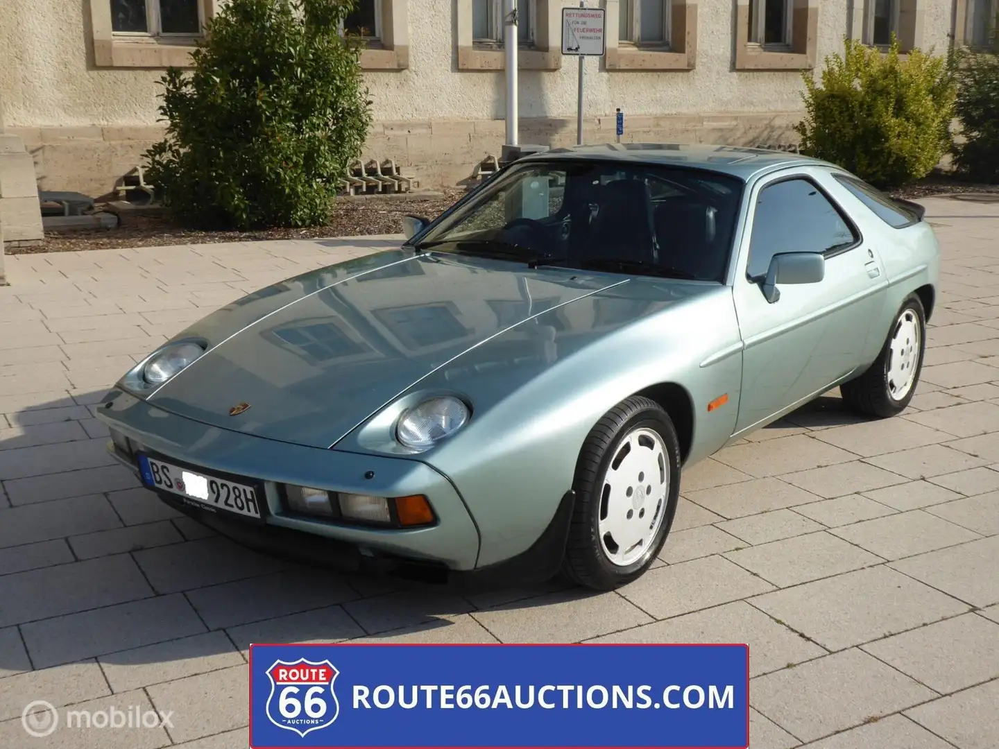 Porsche 928 S Coupe | Route 66 Auctions Blauw - 1