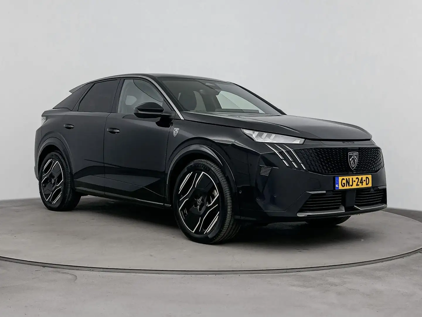 Peugeot 3008 e-3008 SUV GT 73kWh | 1ste eigenaar | FOCAL | Warm Zwart - 2