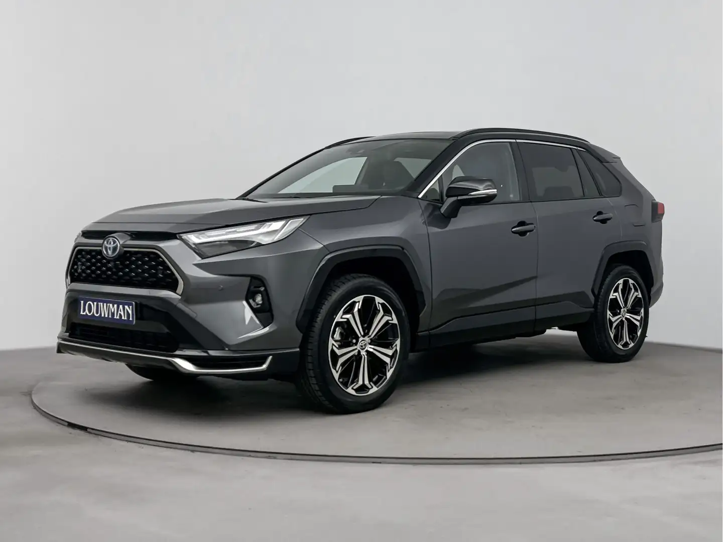 Toyota RAV 4 2.5 Plug-in Hybrid AWD Bi-Tone Plus | Apple Carpla Grigio - 1