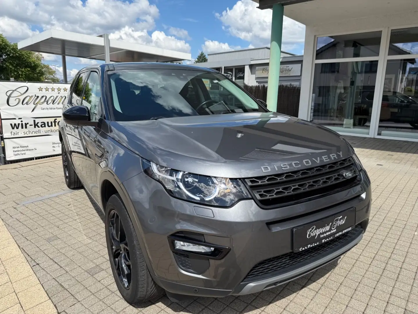 Land Rover Discovery Sport . 2.Hand ,NAVI,AHK,Mwst. Grau - 1