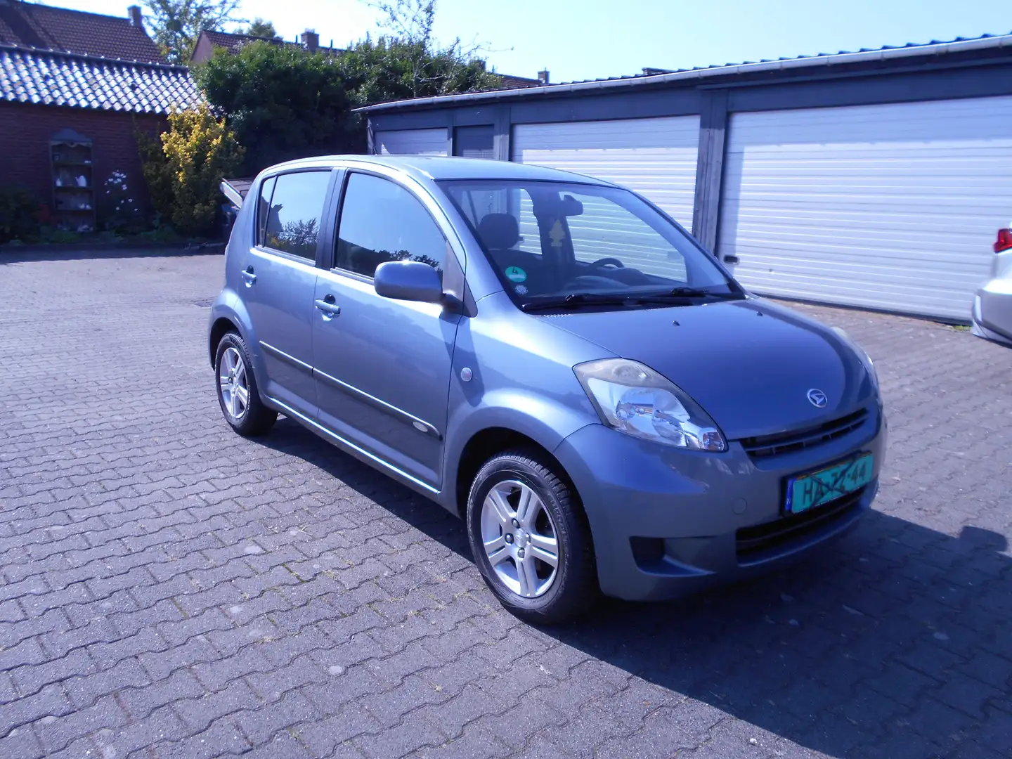 Daihatsu Sirion 1.3-16V Exclusive Grijs - 1