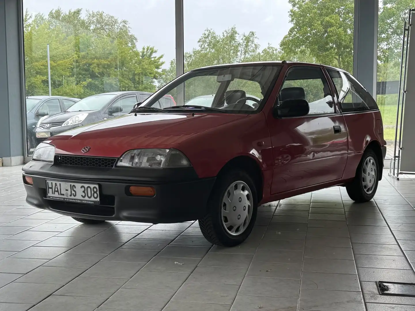 Suzuki Swift Rood - 1