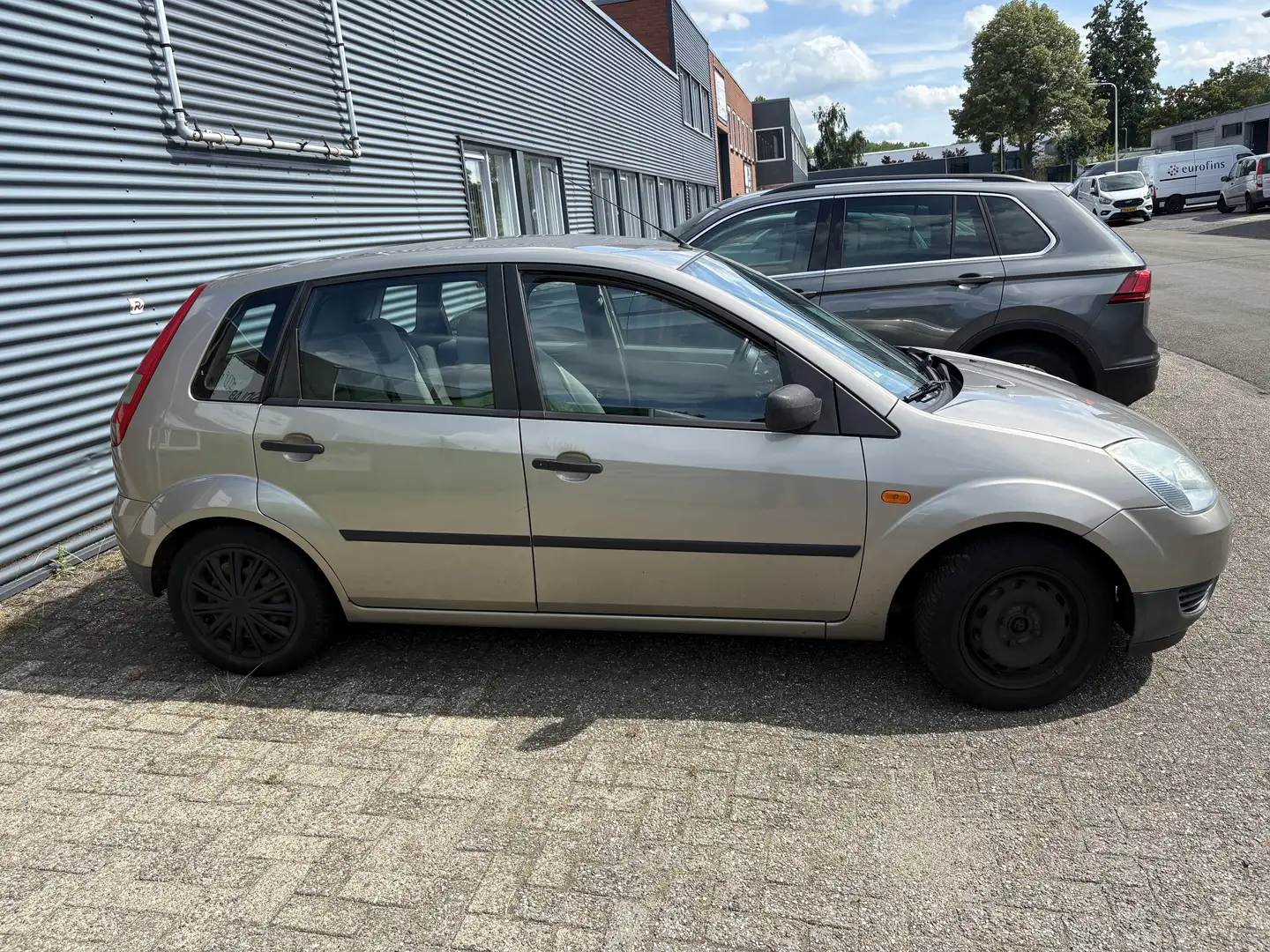 Ford Fiesta 1.25-16V Ambiente Grijs - 1