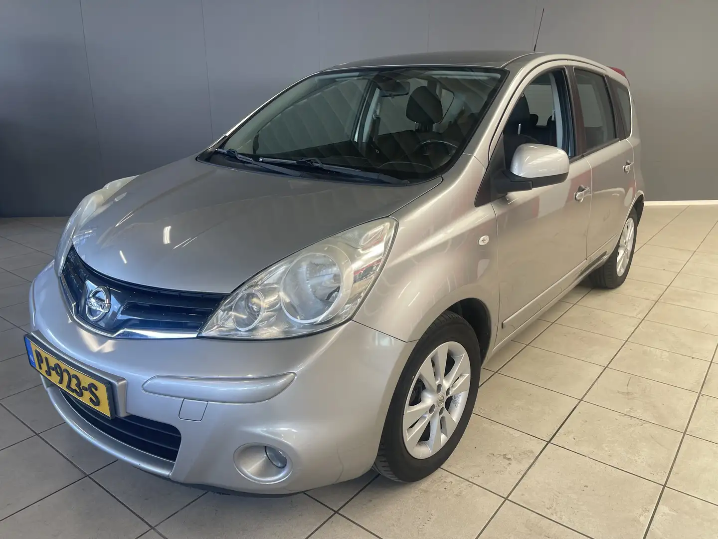 Nissan Note 1.4 Visia Hoge instap, Airco 365 dagen garantie, B Gris - 1