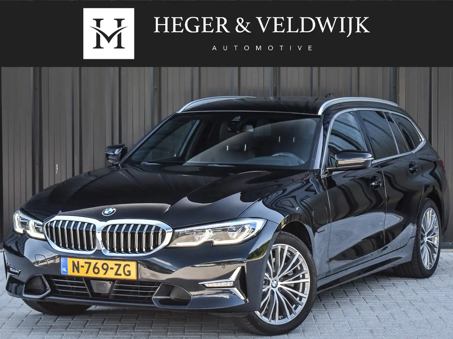 BMW 320 3-serie Touring 320e xDRIVE BUSINESS EDITION PLUS Zwart - 1