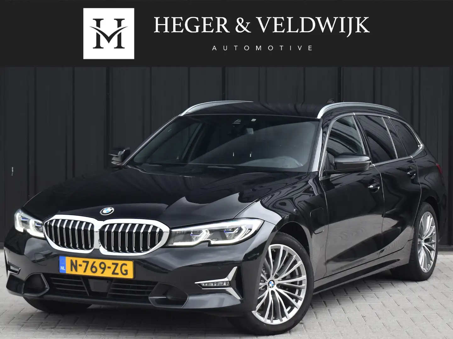 BMW 320 3-serie Touring 320e xDRIVE BUSINESS EDITION PLUS Zwart - 1
