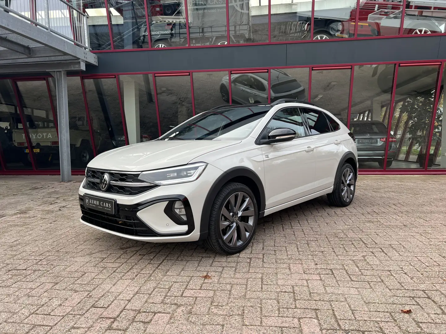 Volkswagen Taigo 1.5 TSI R-Line Edition | 3x R-line | Stoelverw. | Gris - 1