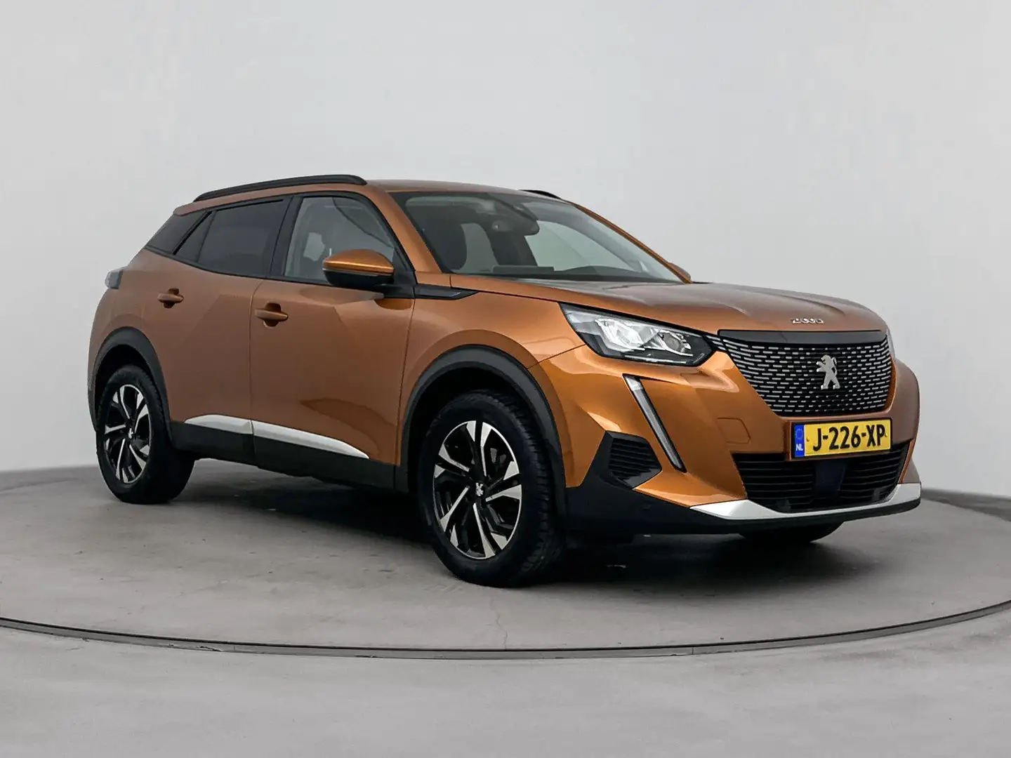 Peugeot 2008 1.2 Allure | Automaat | Vaste trekhaak | NL. auto Oranje - 2