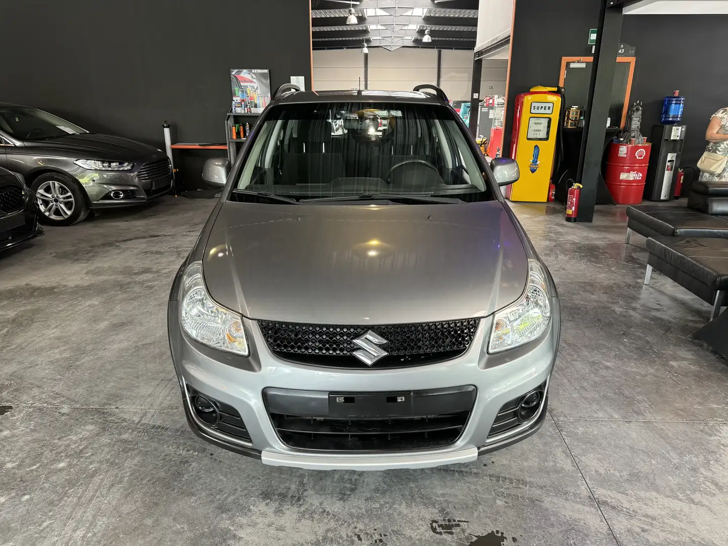 Suzuki SX4 1.5i - 105.118 KM - A/C - MANUEL - VITRES ELEC Grijs - 2