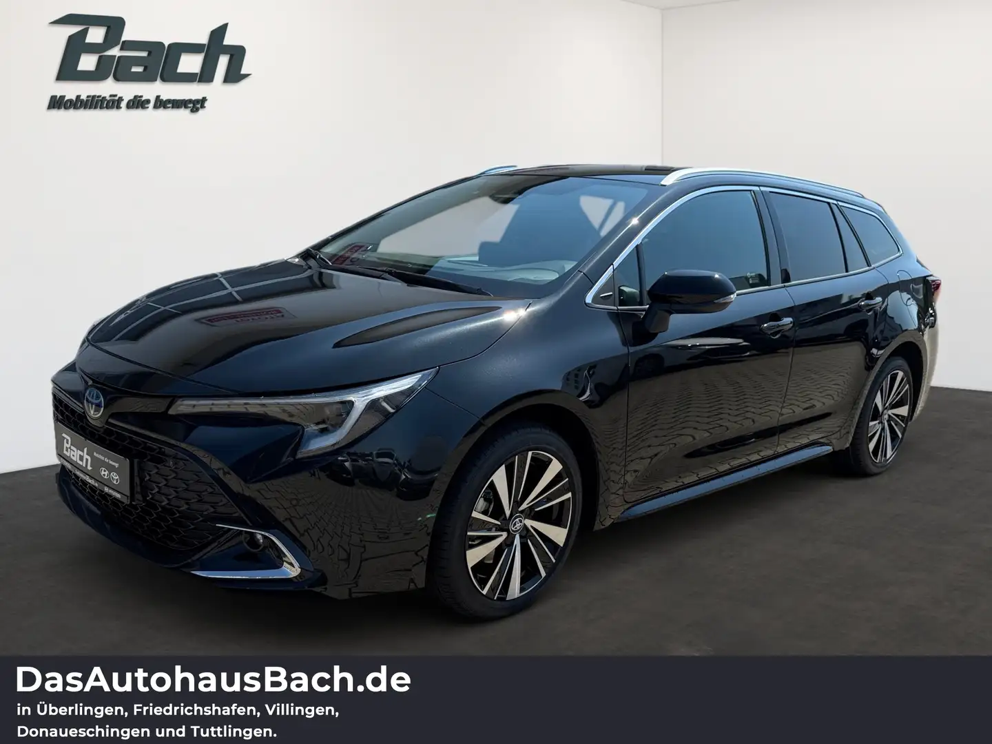 Toyota Corolla 2.0 l Hybrid TS. Teamplayer mit Technik- Schwarz - 1