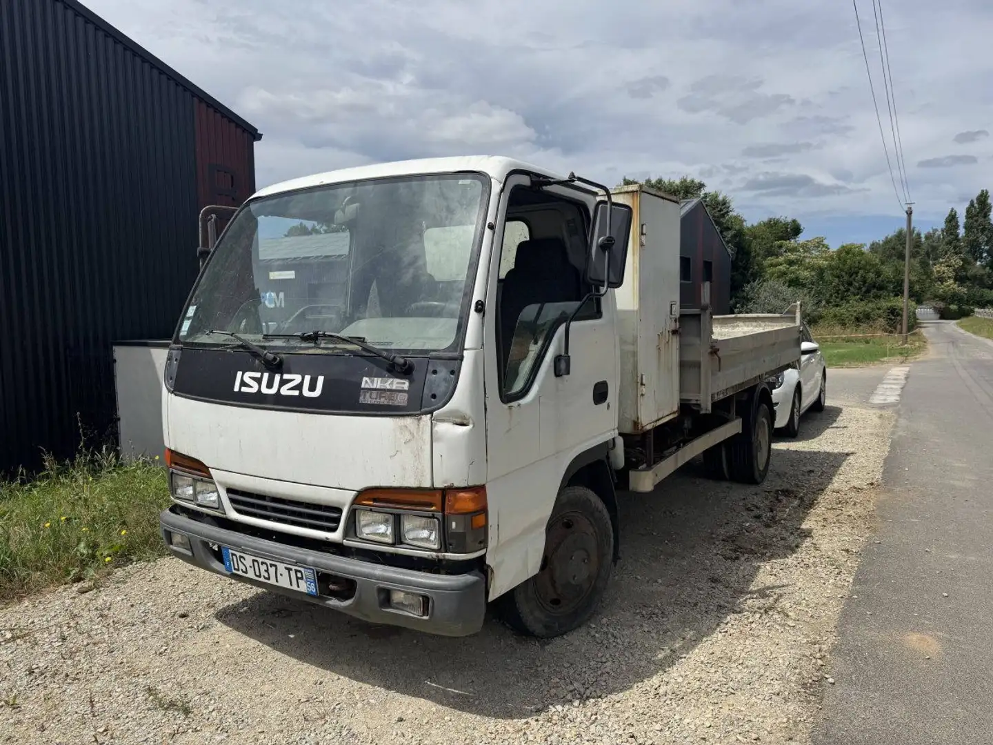 Isuzu Camion benne 130ch Білий - 1