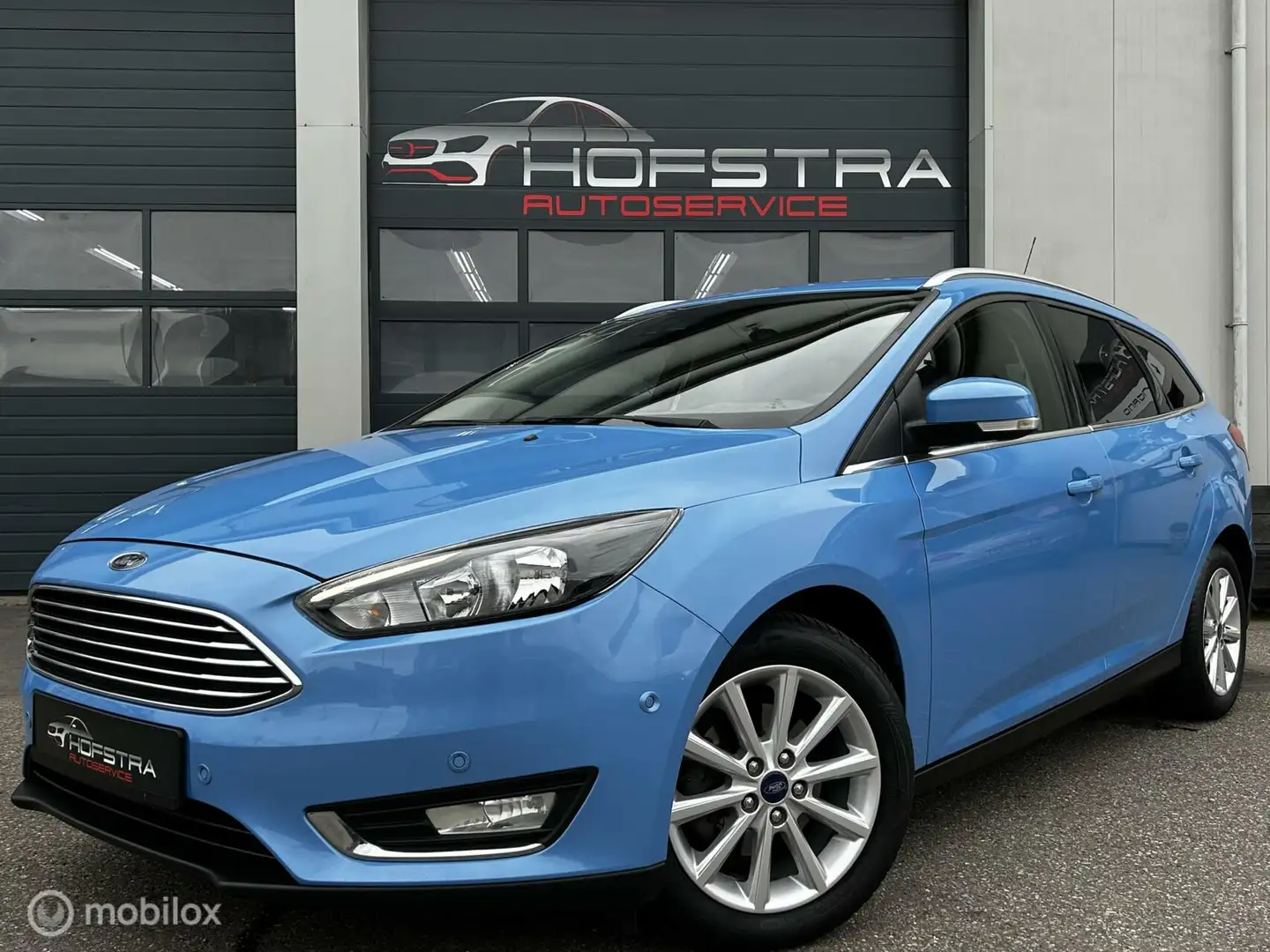 Ford Focus Wagon 1.0 Titanium Navi Stuur/stoel/raamverwarming Blauw - 1