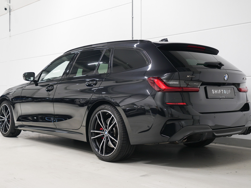 BMW 340 3-serie Touring M340i xDrive Panoramadak | M-Stoel — photo 7