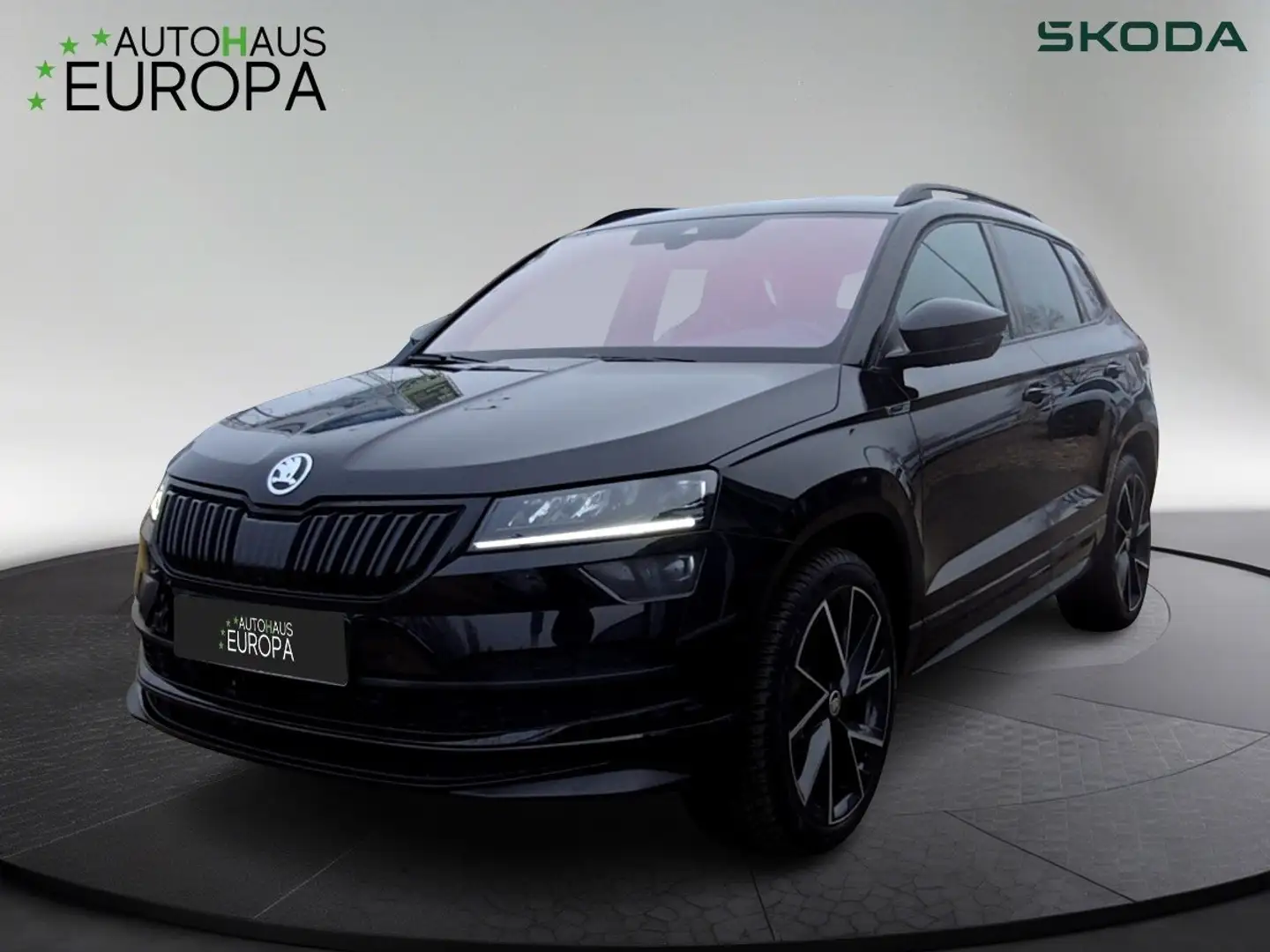 Skoda Karoq 2.0 TDI DSG 4x4 Sportline ACC Kam360 Navi Pano 4xS Schwarz - 1
